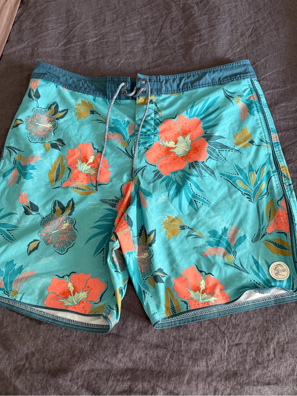 O'Neill Turquoise Swim Shorts with Coral Floral Print